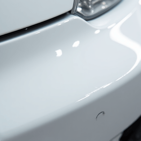 Close-up of a PPF repair in Van Nuys, showing self-healing properties after minor damage. Lifetime warranty service.